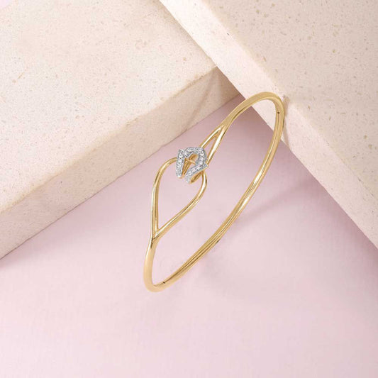 Graceful Twist Diamond Bangle in 14K Yellow Gold, 0.064 ct