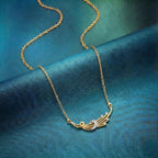 Bold Feather Diamond and Gold Necklace